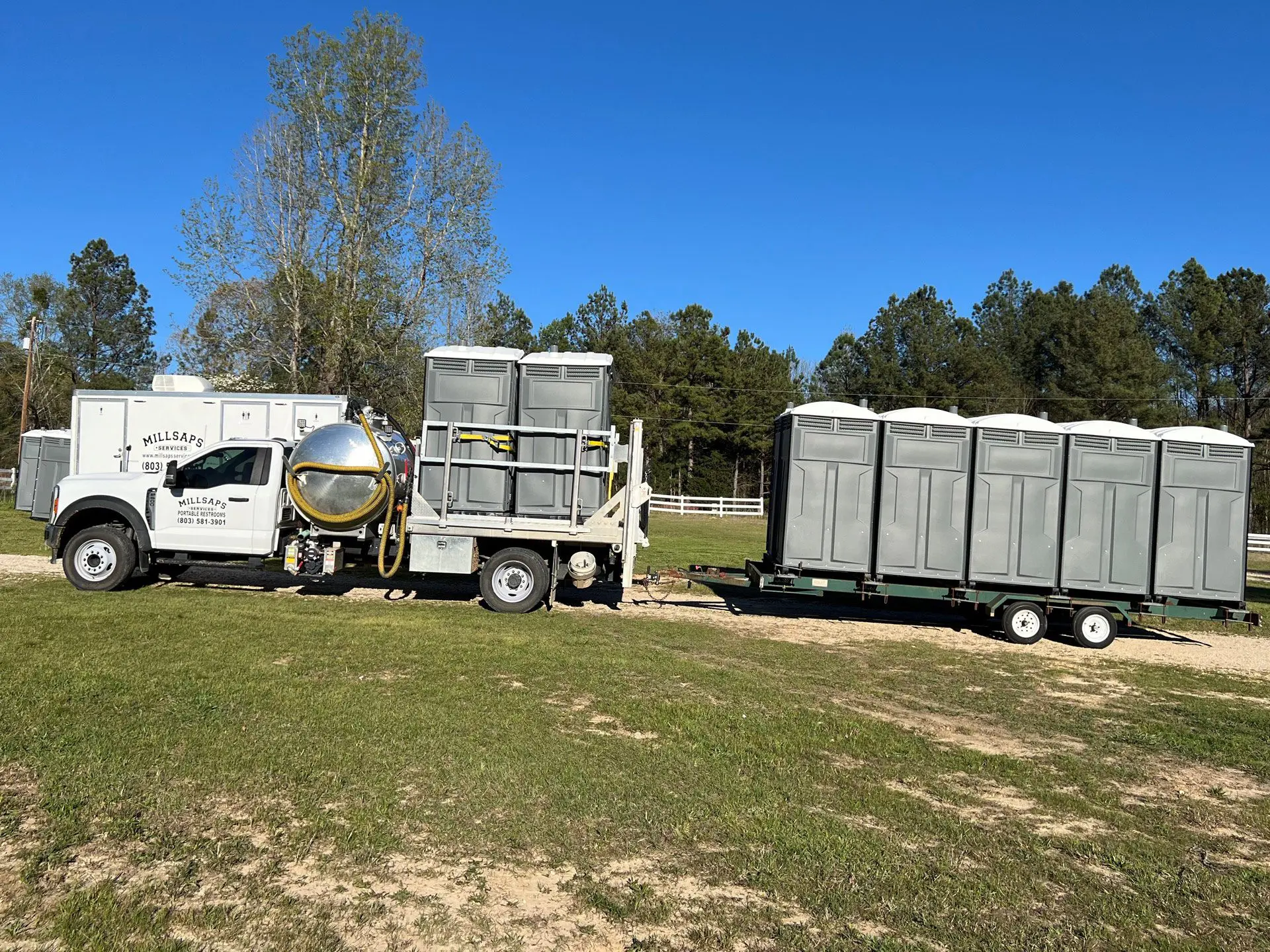 Millsaps-Services-truck-moving-toilets